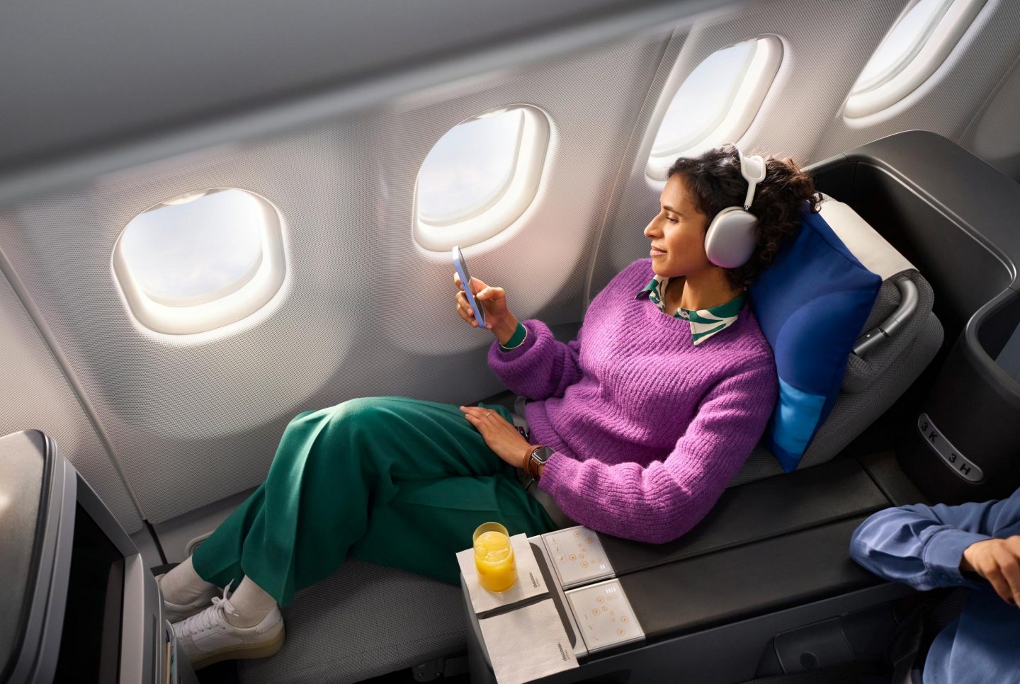       Collection of onboard images from our A330 (-KB) showcasing the different travel classes: Business Class, Premium Economy Class, and Economy Class &mdash;featuring diverse target audiences.                         